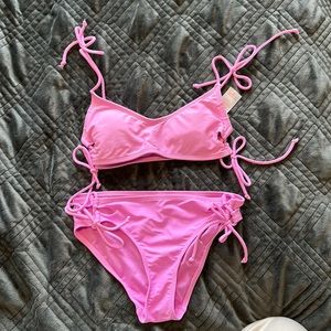 Selling Bikini. The top is a size Small and bottoms are a Medium.